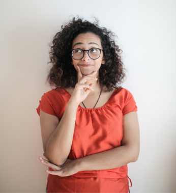 portrait-photo-of-woman-in-red-top-wearing-black-framed-3762807 (1)_edited